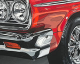 Close-up of a red car's front bumper and tire with chrome details.