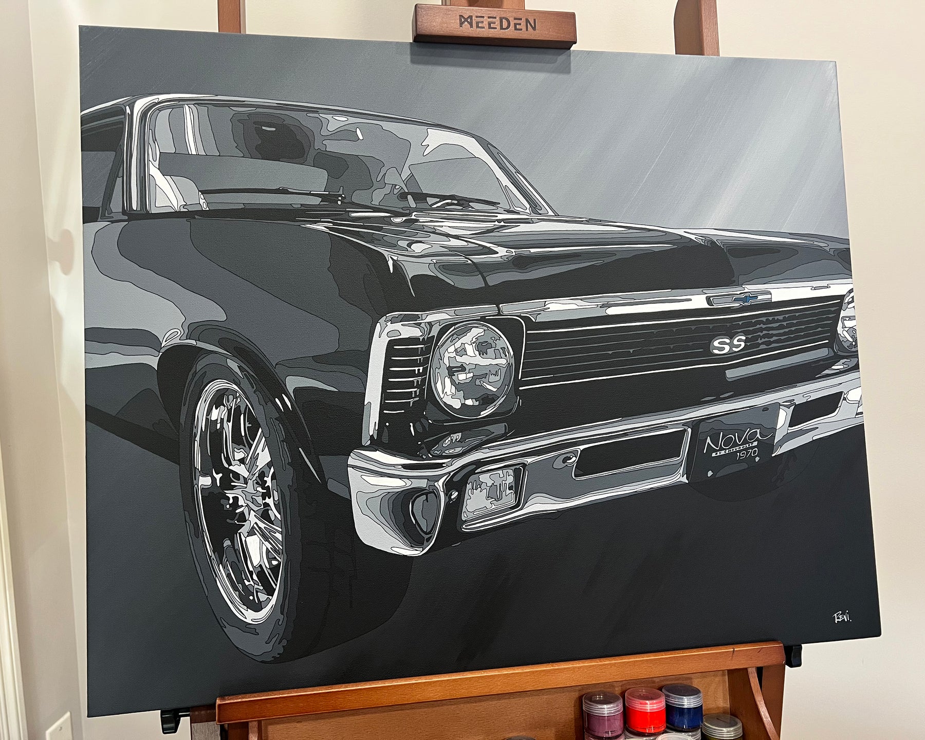Canvas print of a black car on an easel with MEEDEN branding.