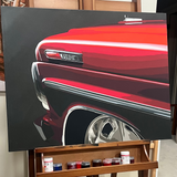 Close-up painting of a red Ford car on an easel with art supplies below.