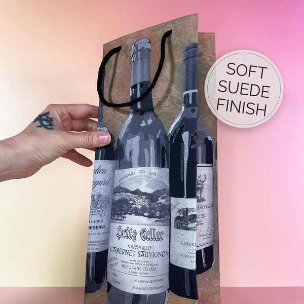 Wine gift bag with Napa wine bottles on a gradient background