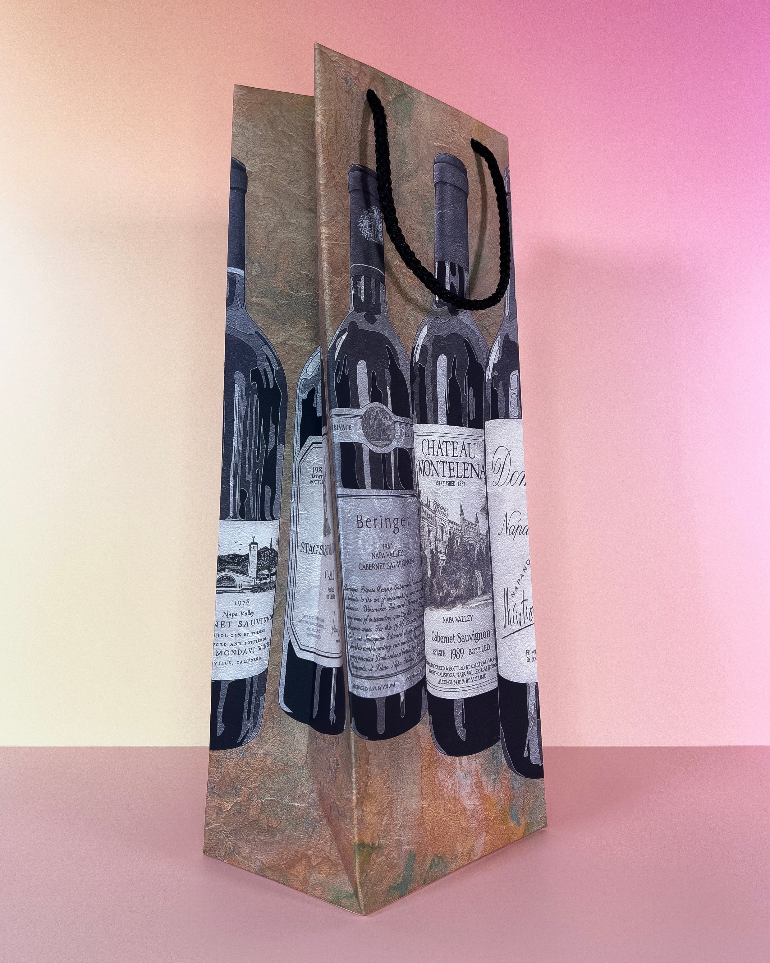 Wine bottle gift bag with wine label design on a gradient background