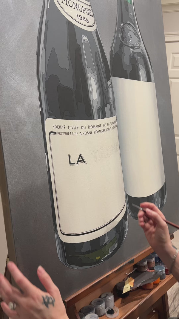Artist Painting wine bottles