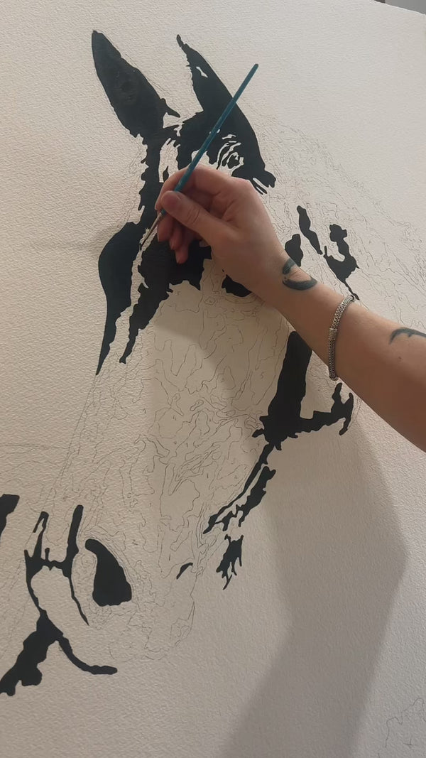 Artist painting horse