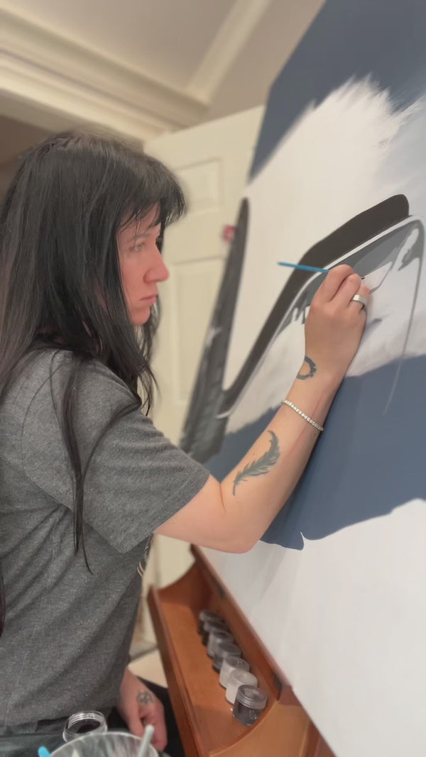 Artist painting on canvas